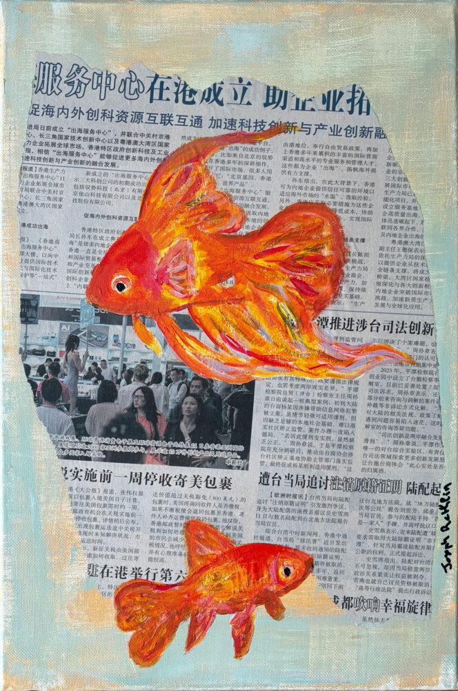 Poissons rouges sur journal chinois.