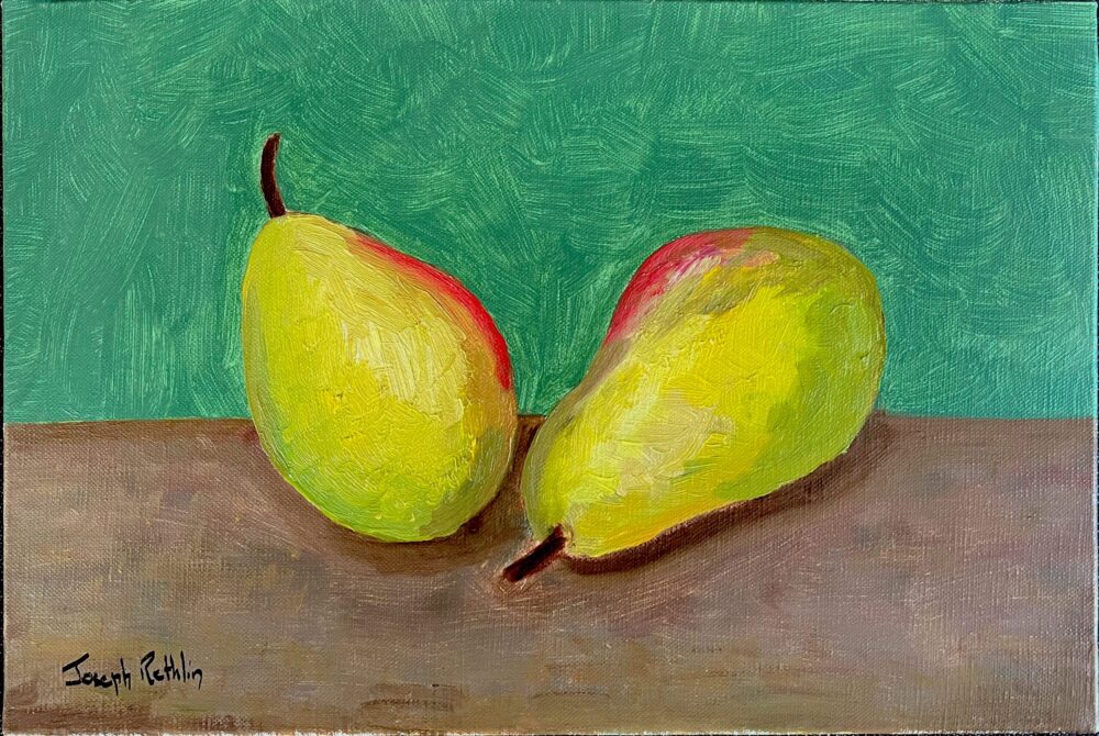 2 poires sur une table